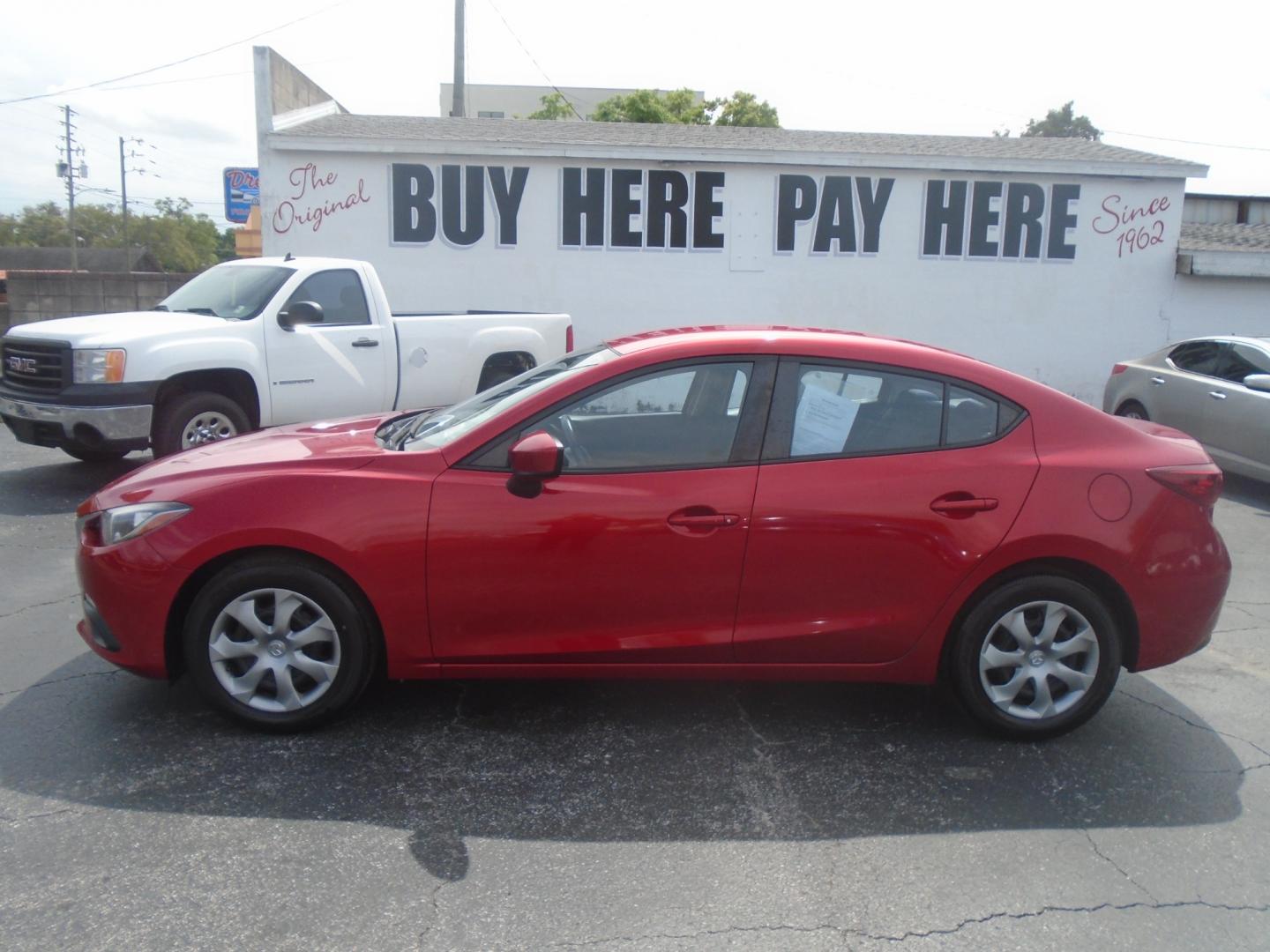 2016 Mazda MAZDA3 (JM1BM1T71G1) , located at 6112 N Florida Avenue, Tampa, FL, 33604, (888) 521-5131, 27.954929, -82.459534 - Photo#0